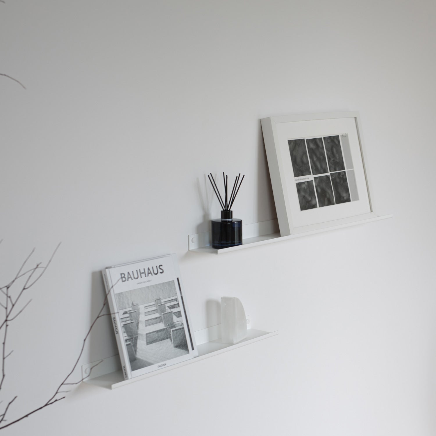 White shelf for picture frames display wall shelves on white wall